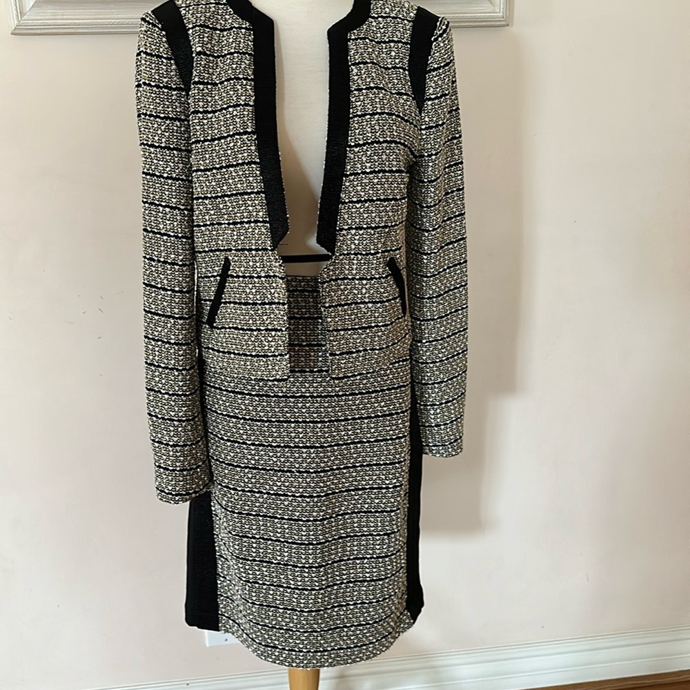 BEBE 2 piece skirt and jacket set.